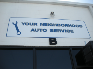 Your Negihborhood Auto Service Sign 
